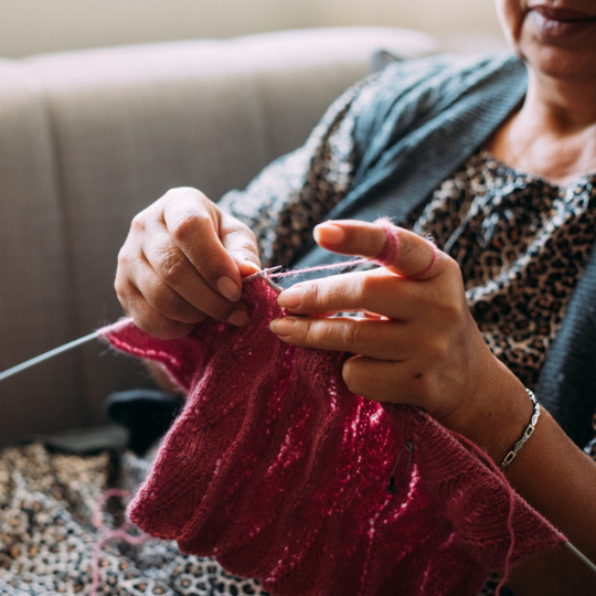 73_9282_09Jan2025133403_Close up of a womans hands with knitting needles 540px.png